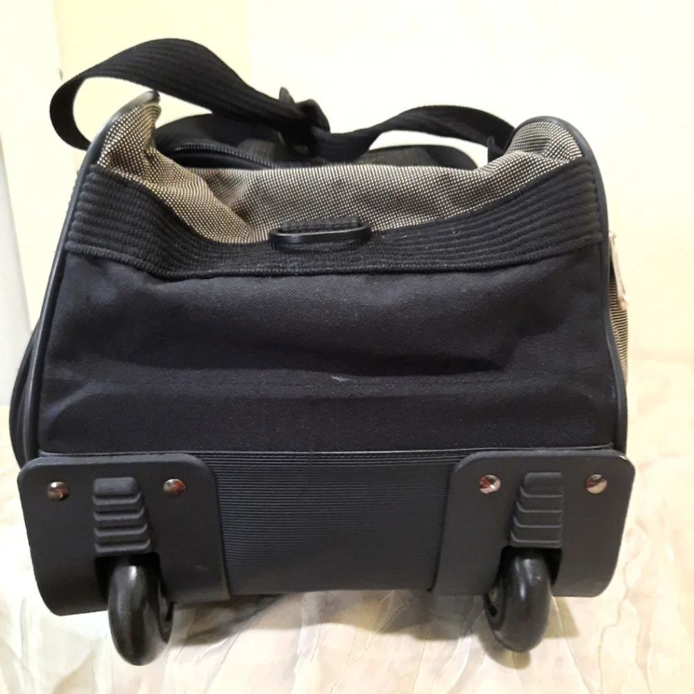 Calpak rolling duffel bag
